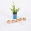 danby white marble oval cheese board with sushi